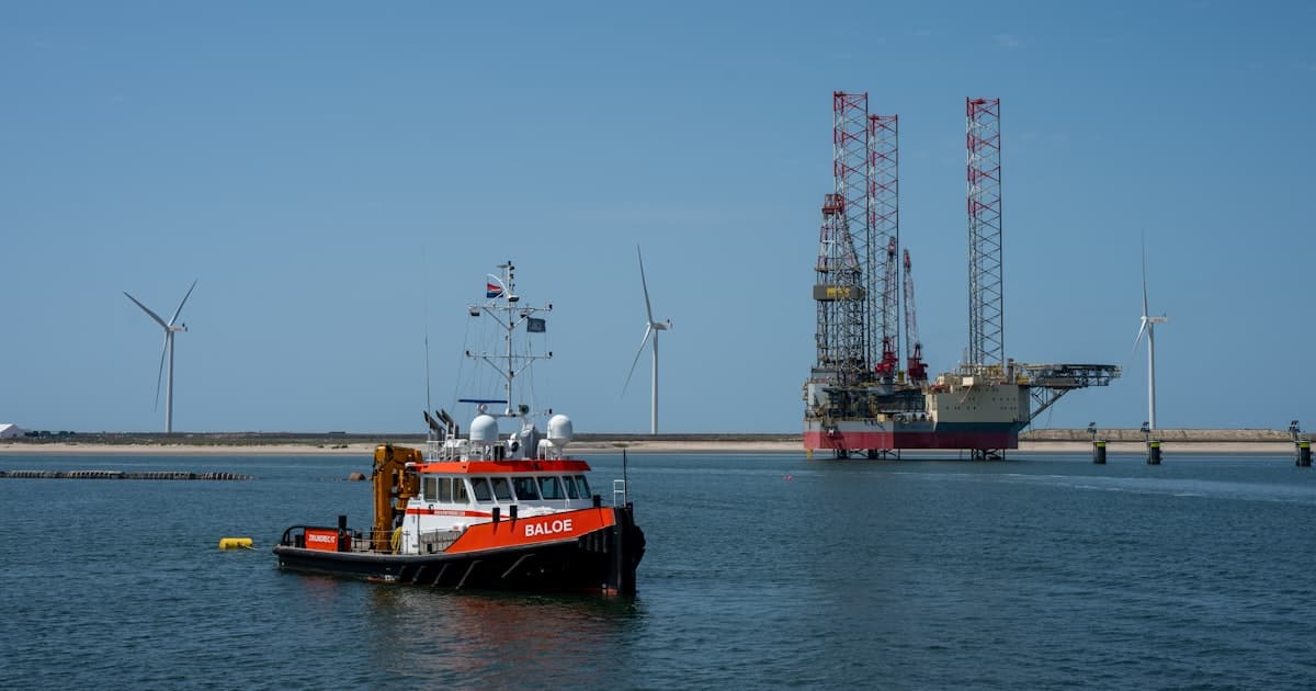 A vessel and a drilling rig beside wind turbines. Offshore is a small sector with very large individual orders.