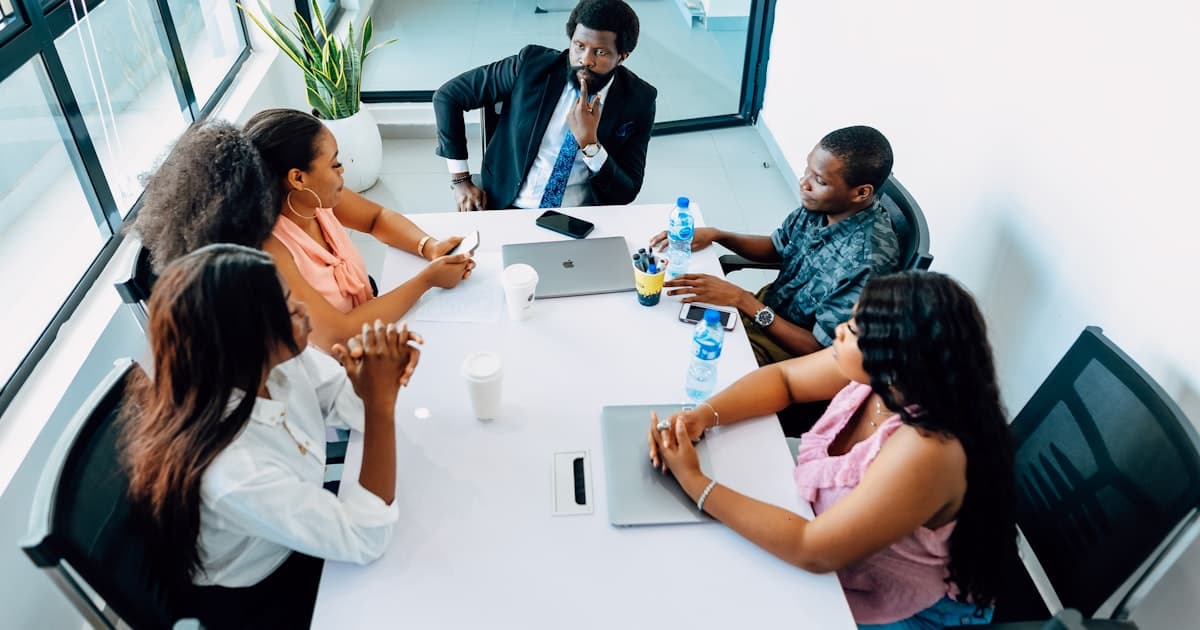 People around a table. The first conversation about an AI scan is about priorities, not systems.